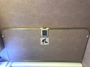 Most airplanes are equipped wit c hanging trays