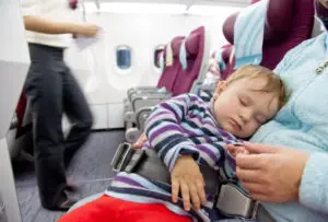 Baby sleeping during in lap flight