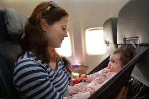 Mom Holding Baby during Flight
