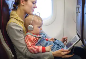 Keeping your child occupied especially during take off and landing times.