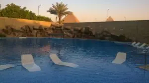 A Hotel Pool with View of the Giza Pyramids