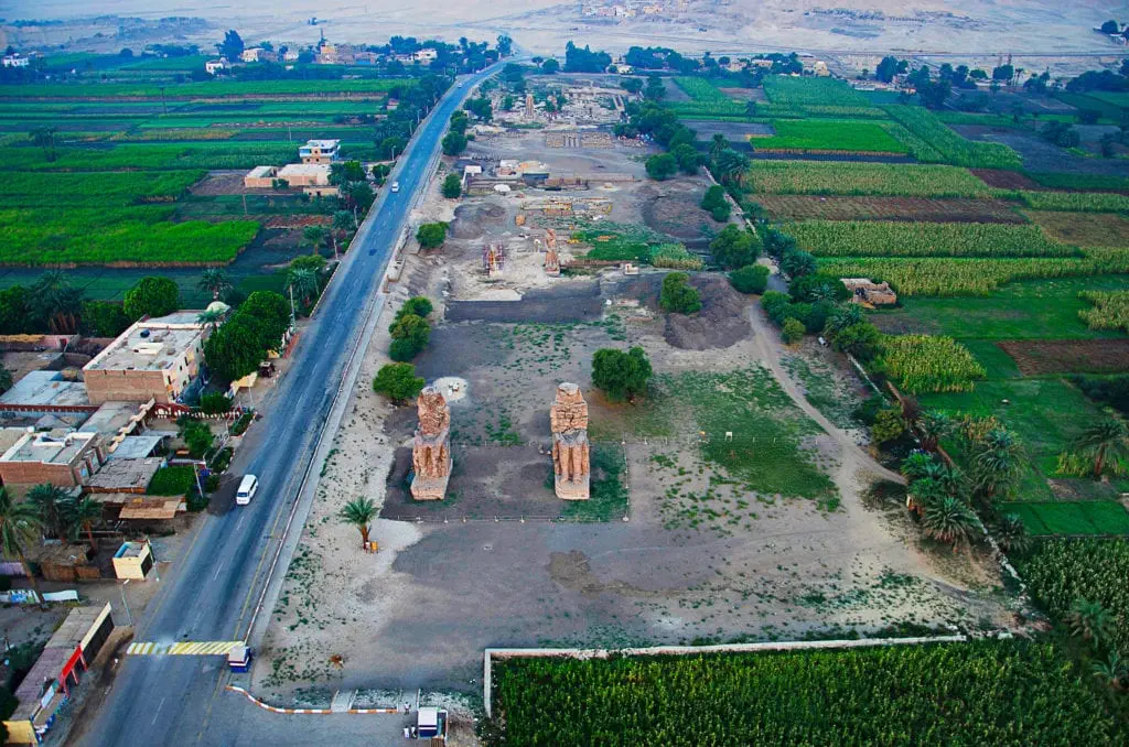 Colossi of Memnon Aerial view. These are Two massive statues of the Amenhotep III - Luxor - Egypt