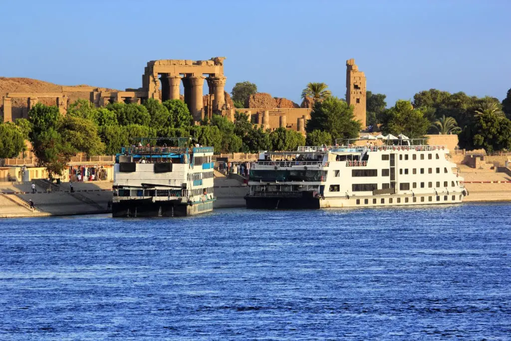 The Temple of Sobek in Kom Ombo - Aswan With Cruise ships docked on the Nile - Egypt